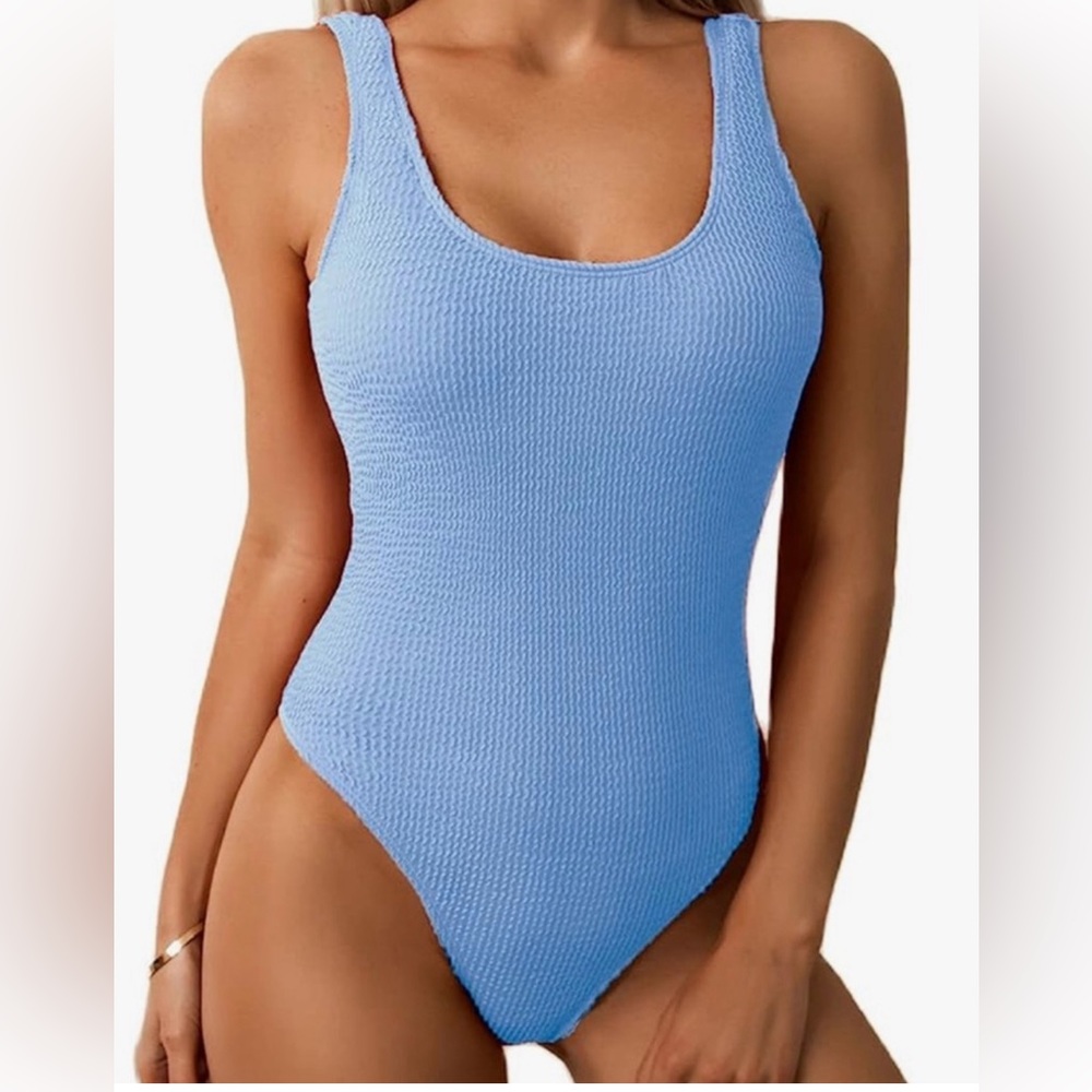 Women Pucker Textured One Piece Scoop Neck and low back swimsuit. Size: Small
